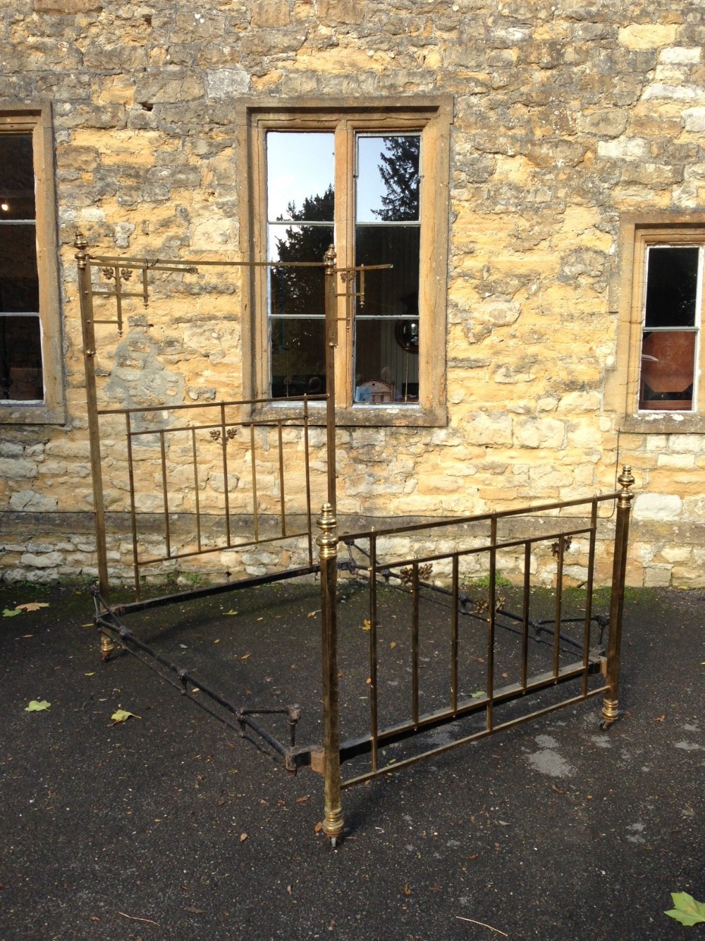 A Victorian brass half tester king size bed c 1880