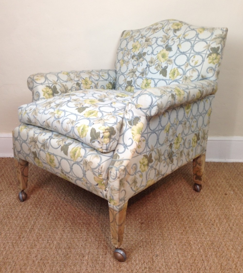 A 1930`s down filled armchair