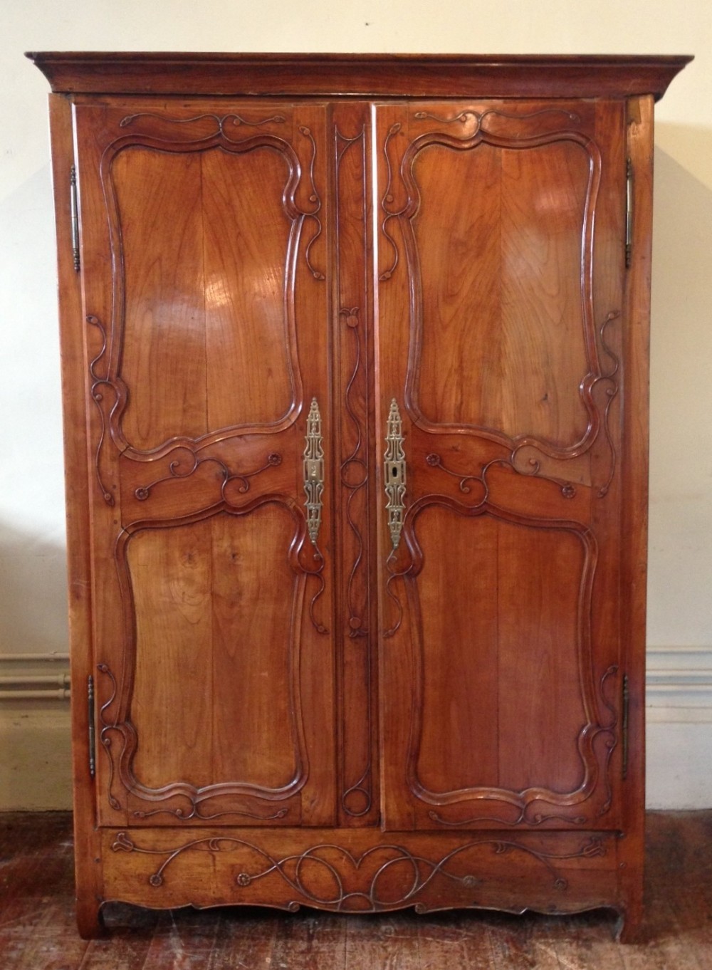 A late 18th c Normandy fruitwood armoire c 1800