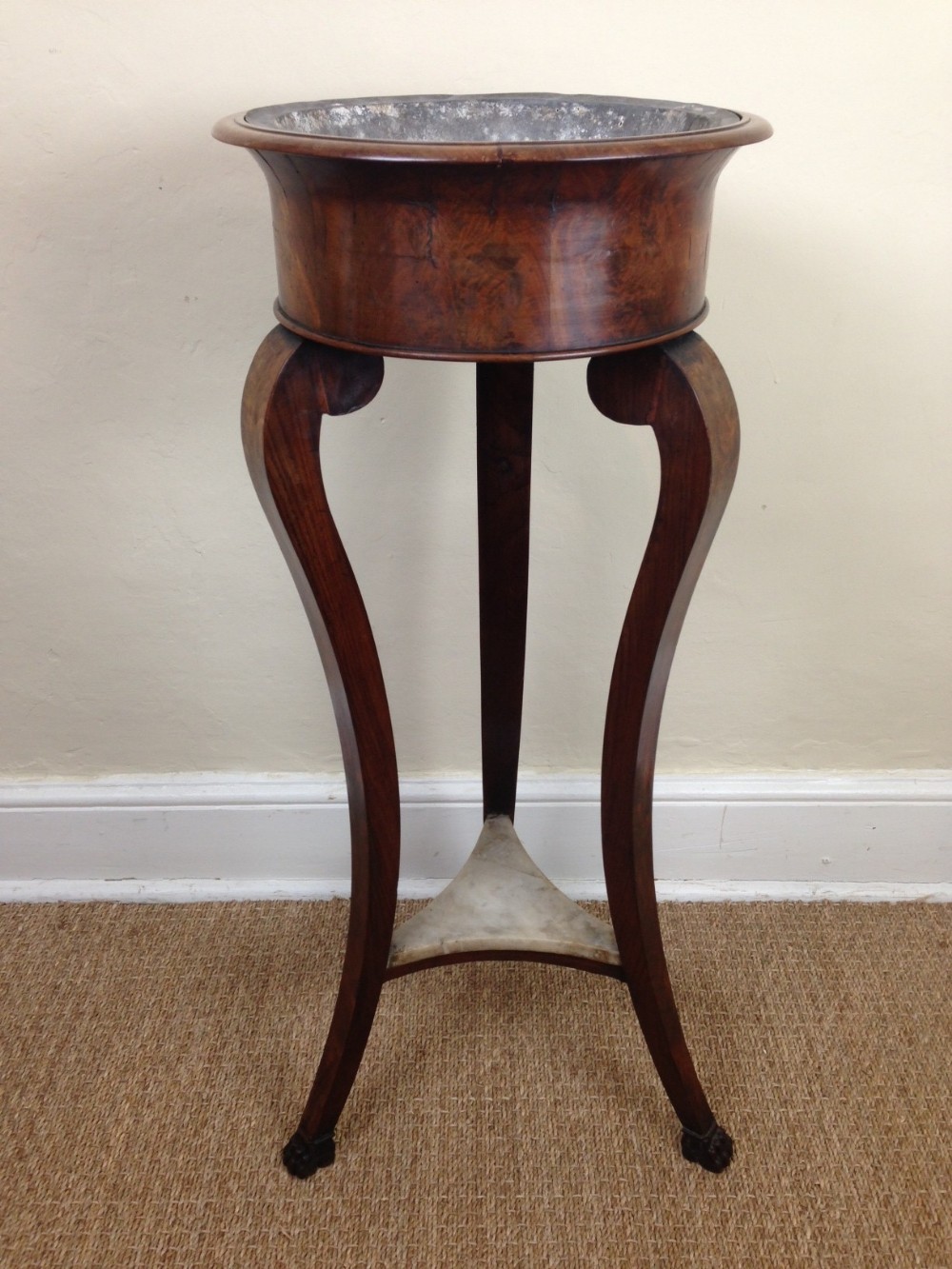 A French 1st Empire mahogany jardiniere stand c 1810