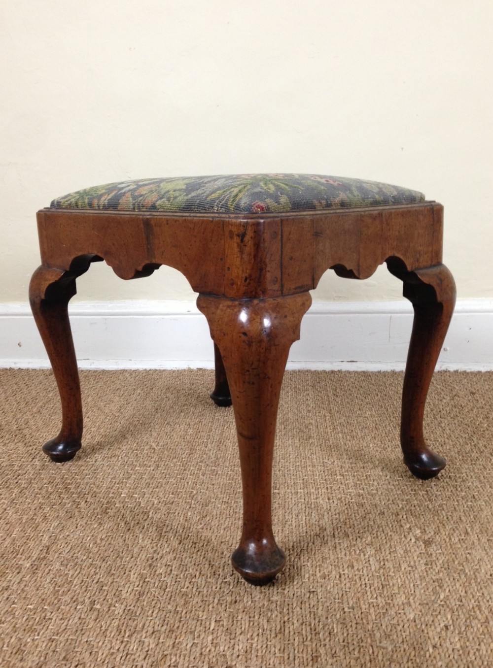 An early George 11 walnut cabriole leg stool c 1740