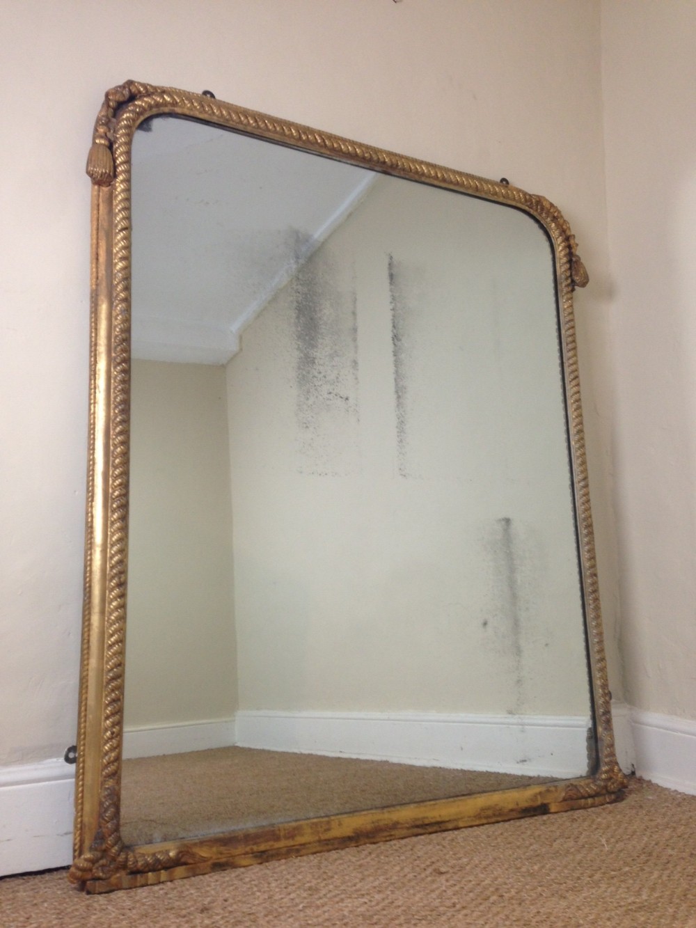 A large early Victorian gilt rope twist mirror c 1860