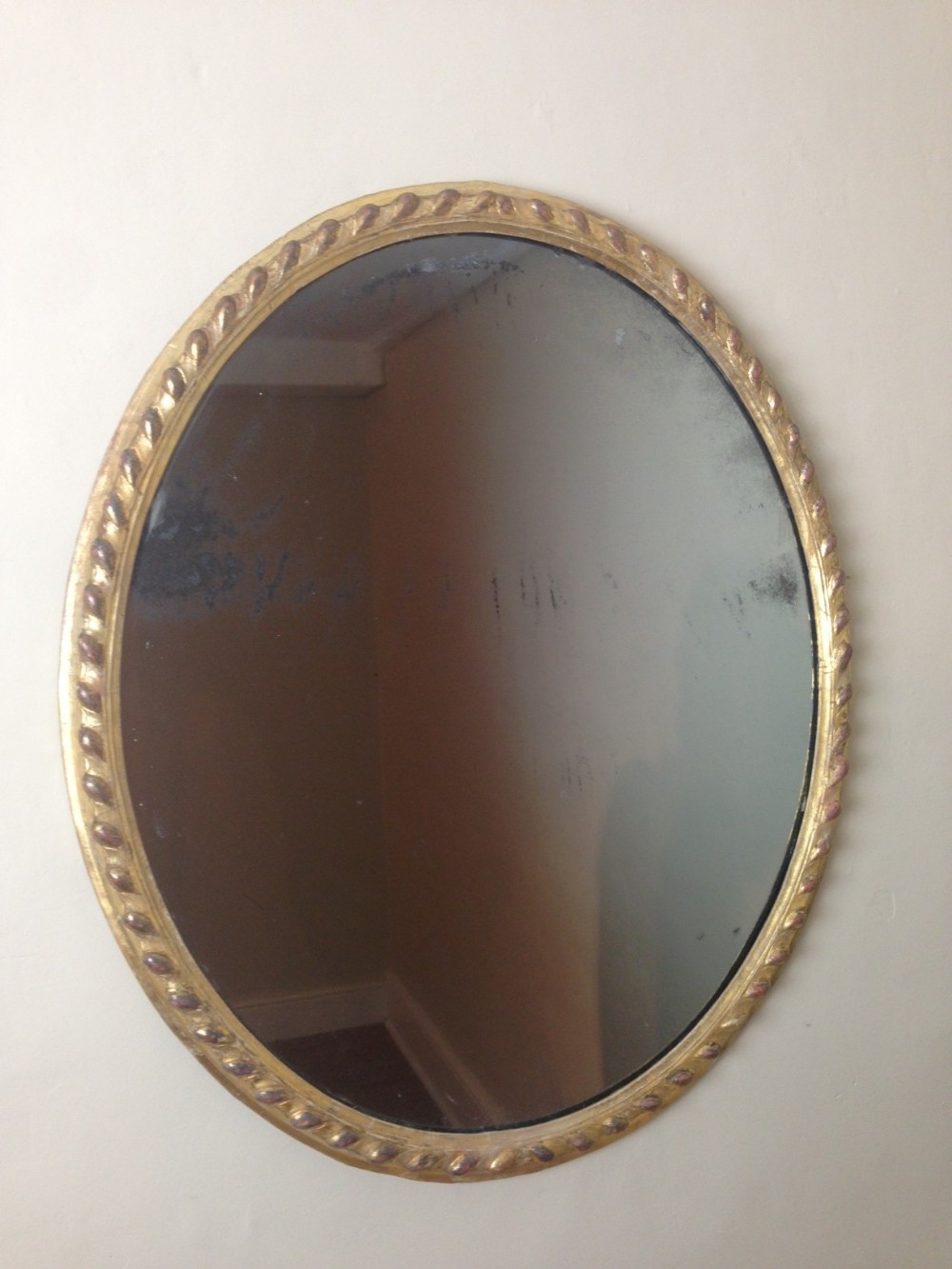 A George 111 gilt oval mirror c 1780 in lovely original condition.