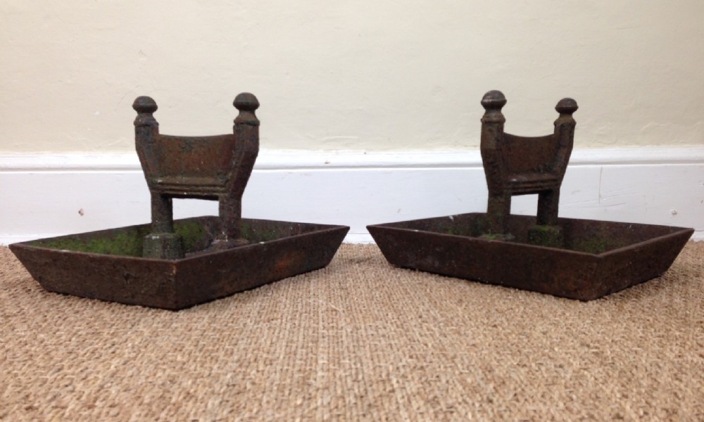 A pair of late Regency cast iron boot scrapers c 1830 