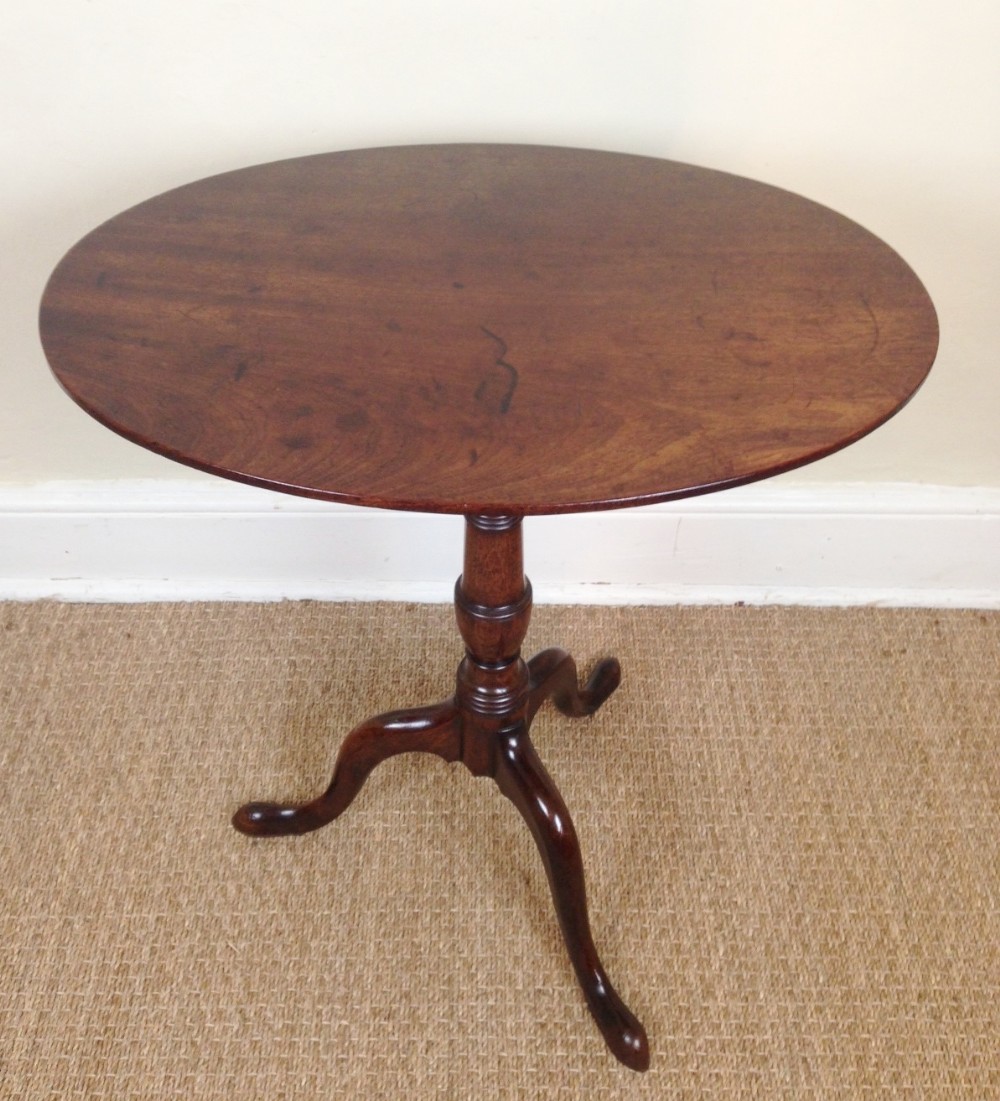 A George 111 mahogany oval tripod table c 1810