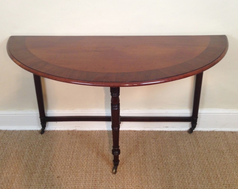 A Regency mahogany demi lune console or hunt table c 1820 