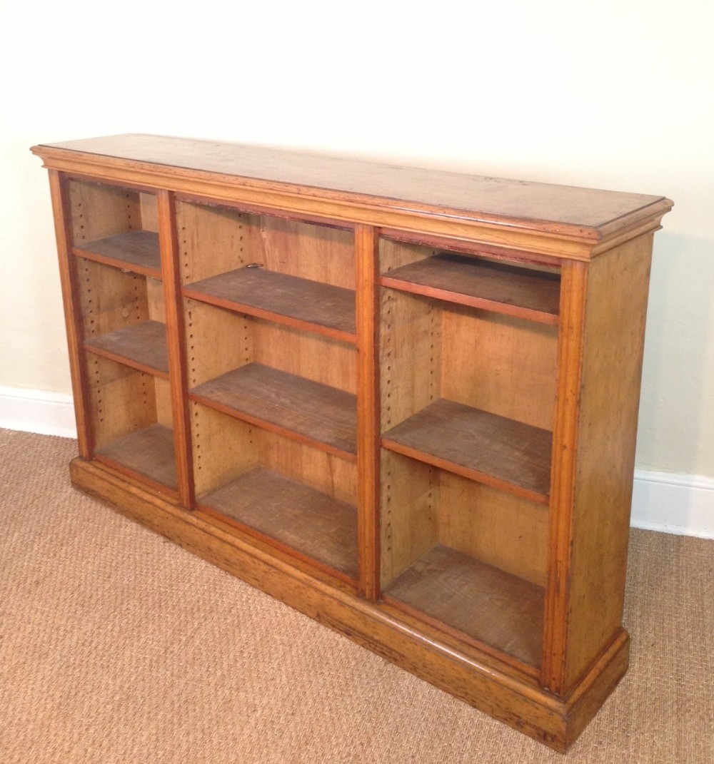 A Victorian oak open bookcase c 1880 in golden oak 