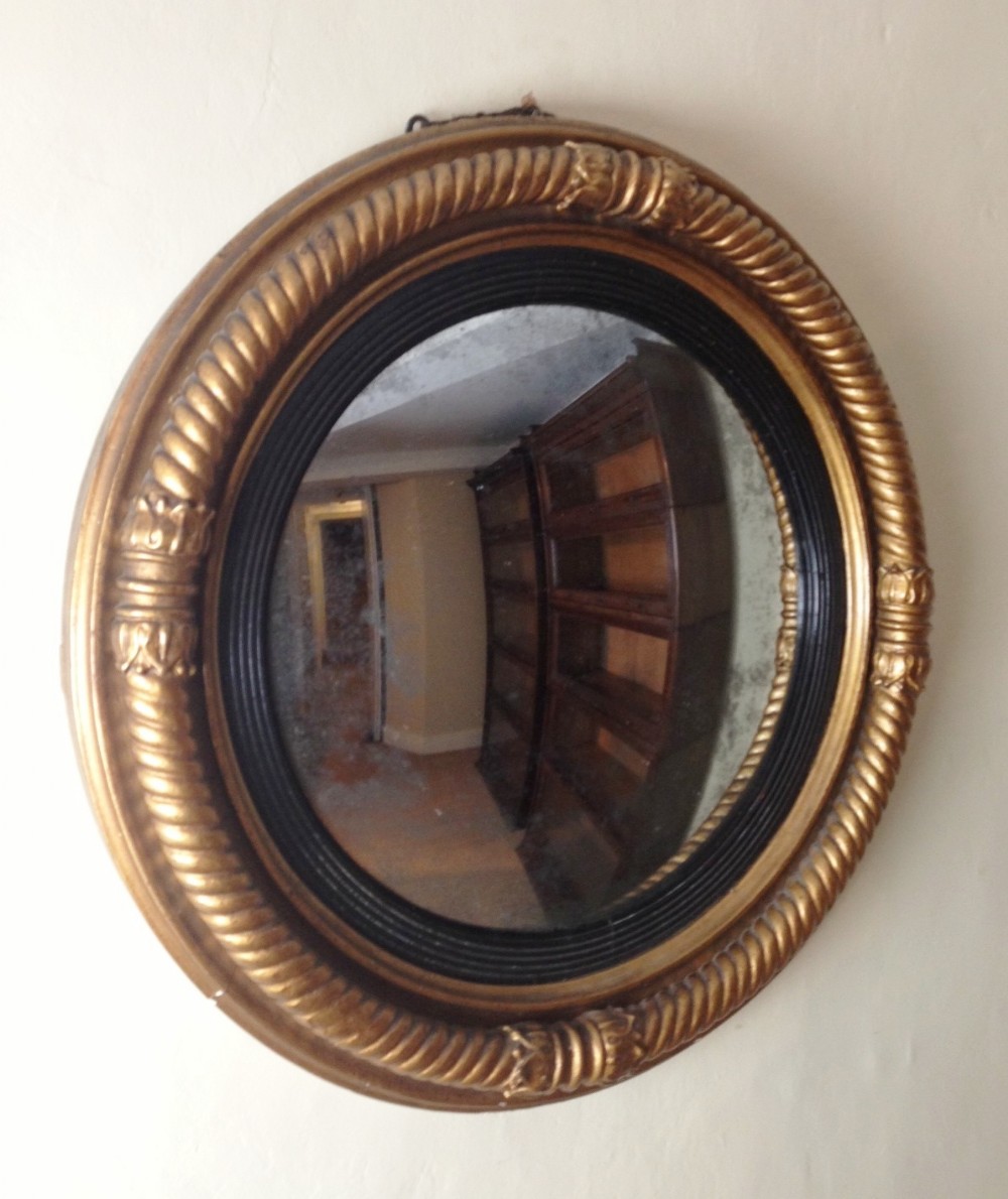 A George IV gilt rope twist convex mirror c 1825