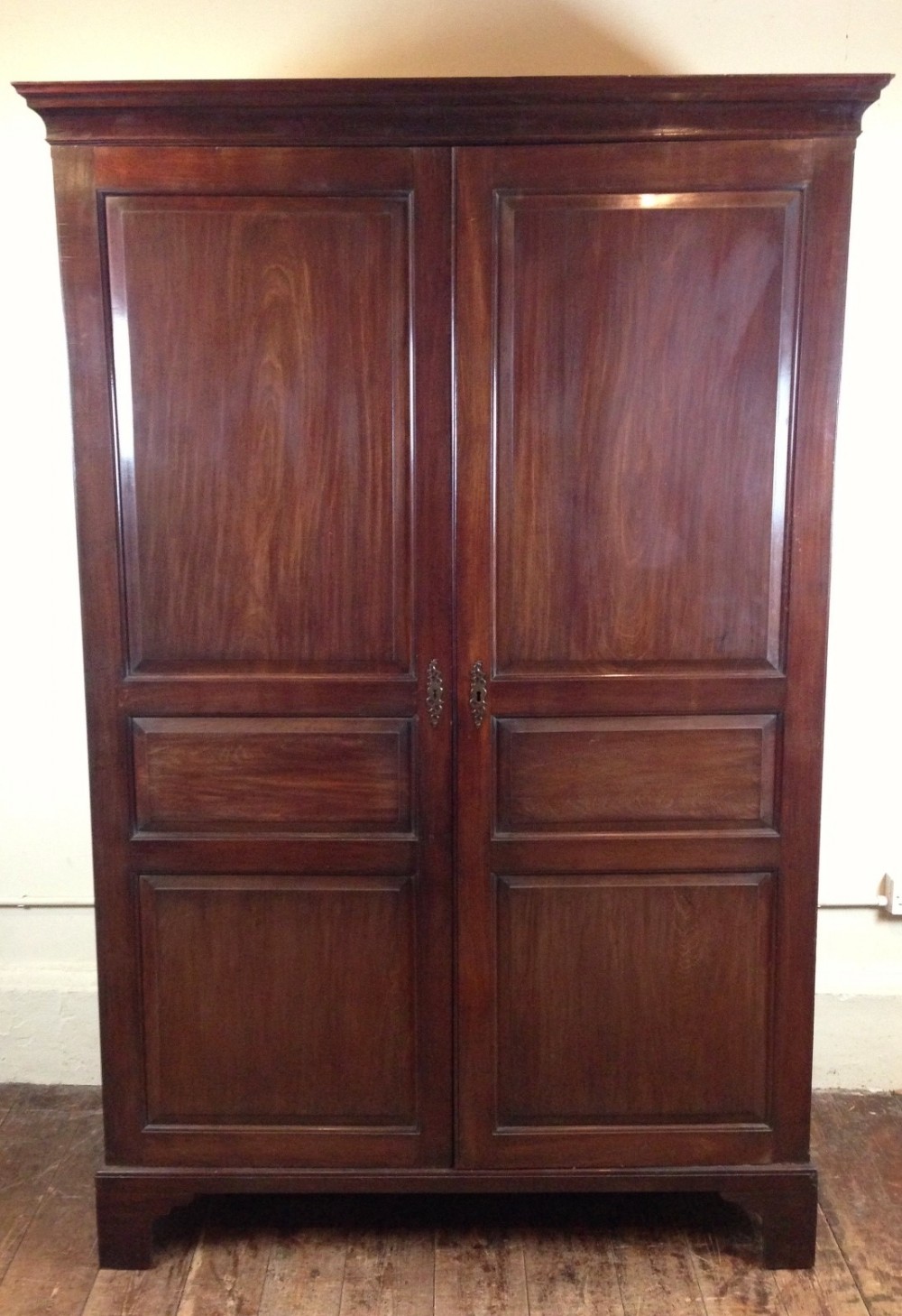 An early George 111 mahogany wardrobe c 1770 