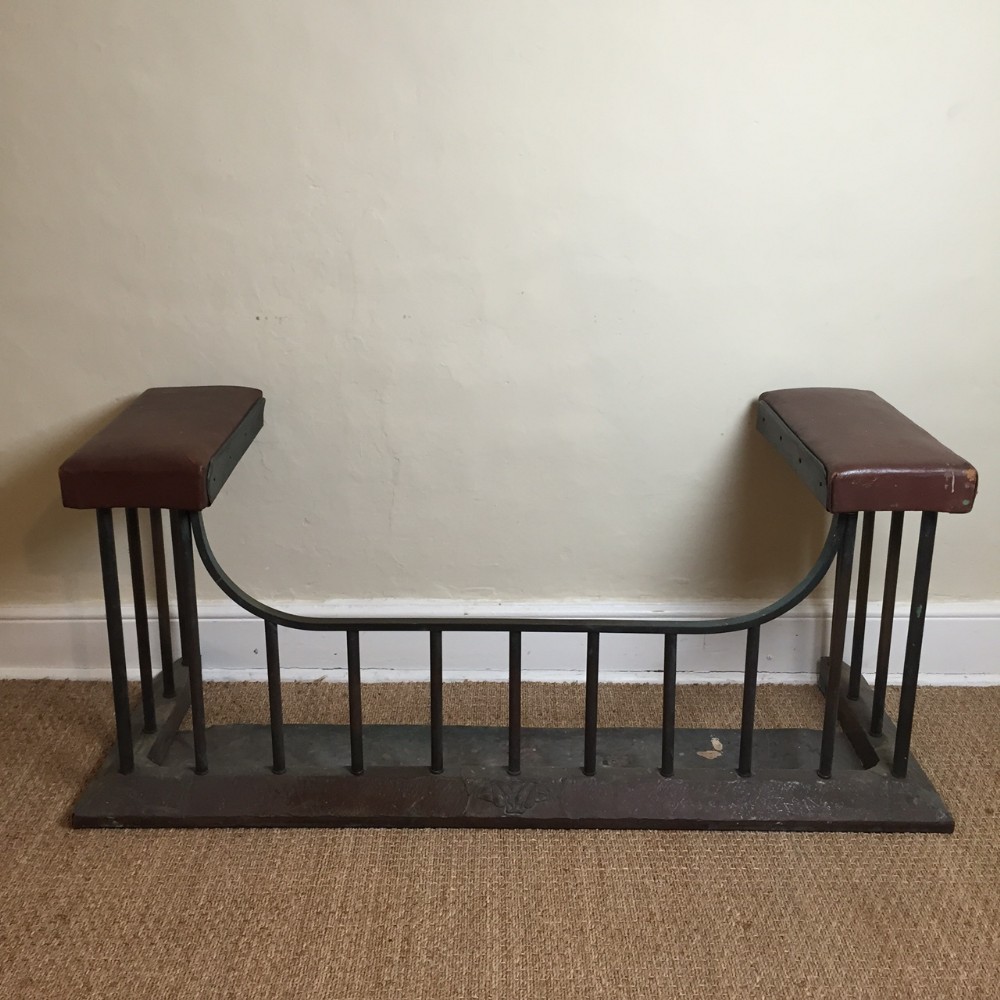 An Edwardian copper and brass club fender c 1910