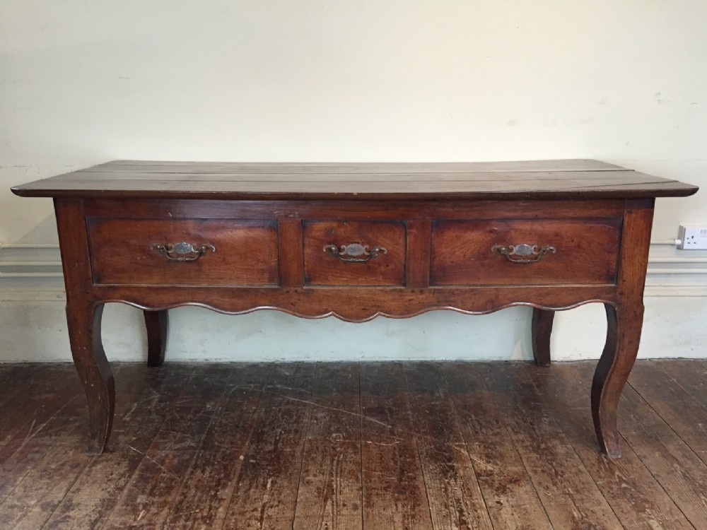 A 19th c French fruitwood serving table 