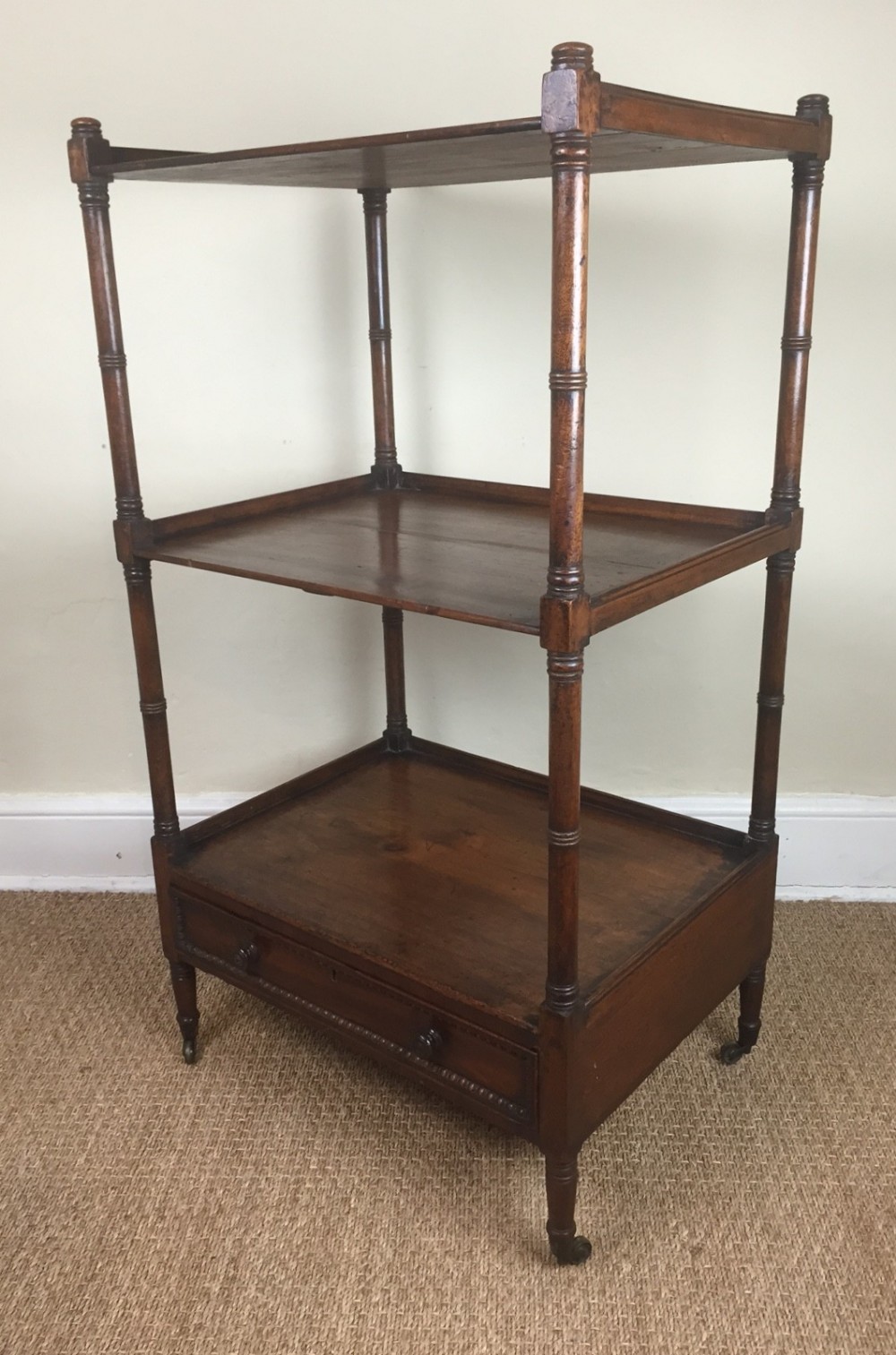 A George IV mahogany 3 tier stand c 1825
