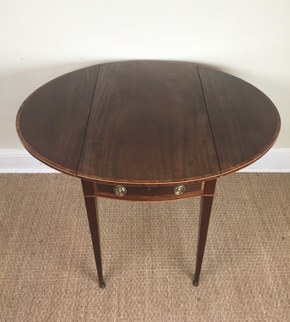 A George 111 mahogany oval Pembroke table c 1790 