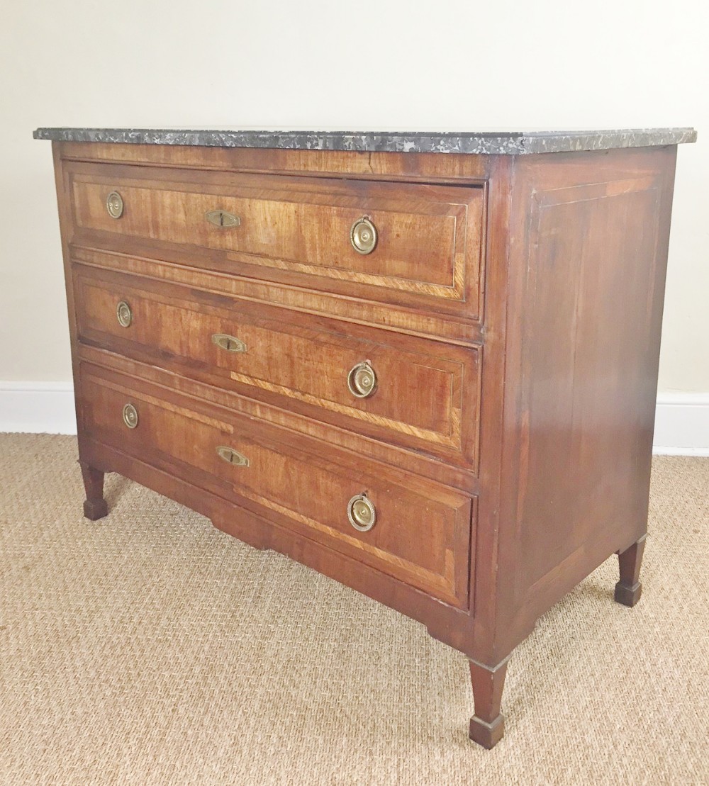 A French Empire walnut and brass banded commode c 1820
