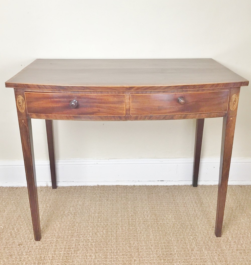 A George 111 mahogany bow front side table c 1790