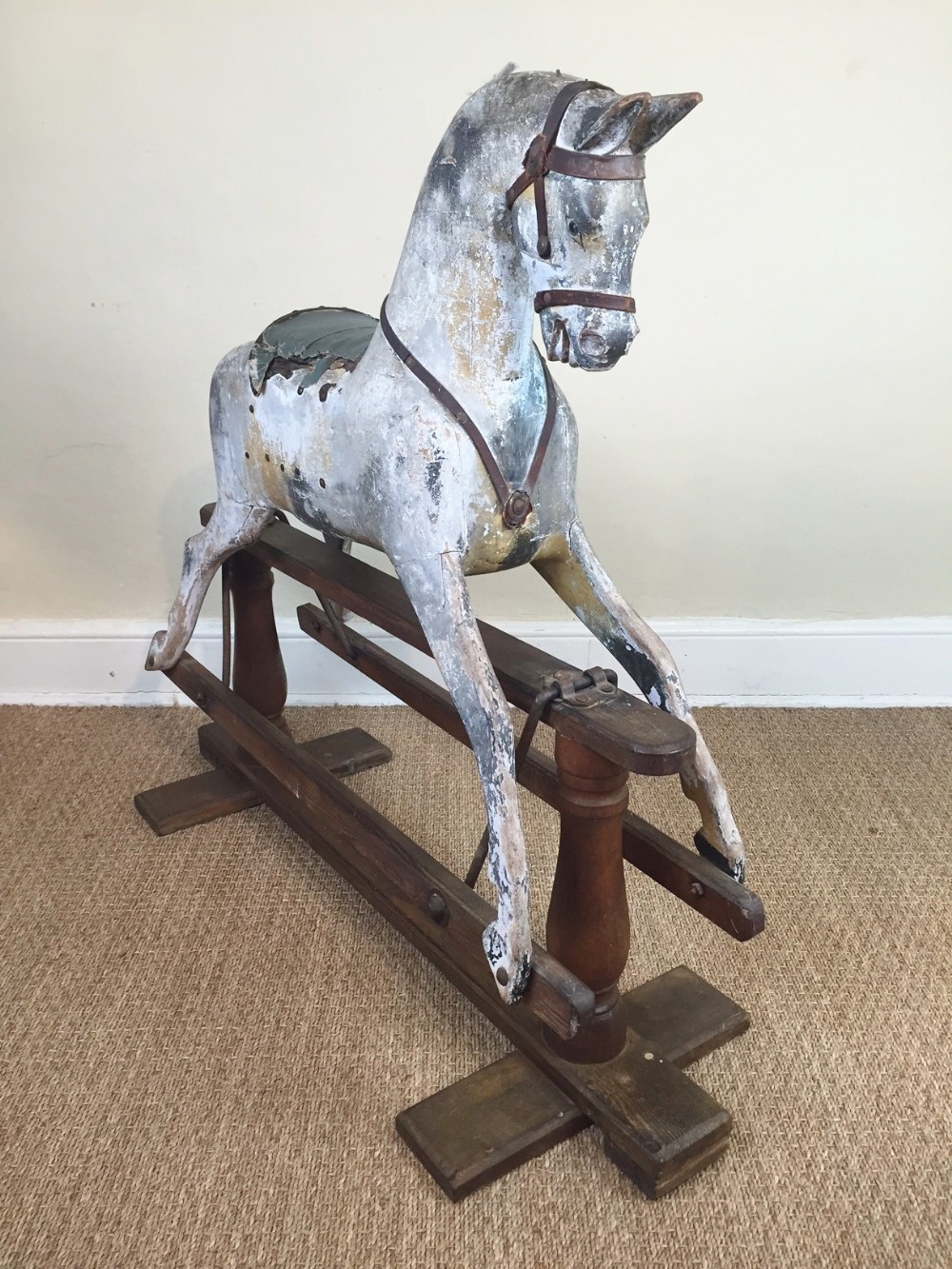 A Victorian painted rocking horse c 1890 in wonderful original condition.