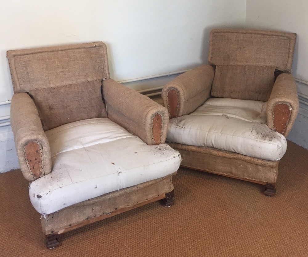 A large pair of Edwardian birch and mahogany armchairs for recovering c 1910