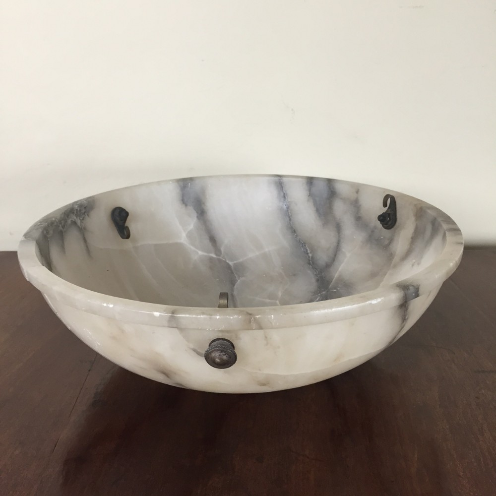 A late 19th century Alabaster dish light in the classical style with original brass fitments lacking chains.