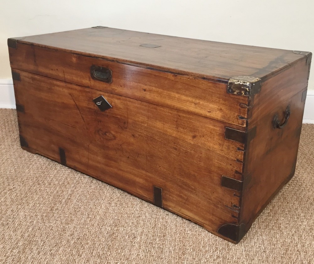 A 19th century camphor wood and brass banded campaign chest c 1870