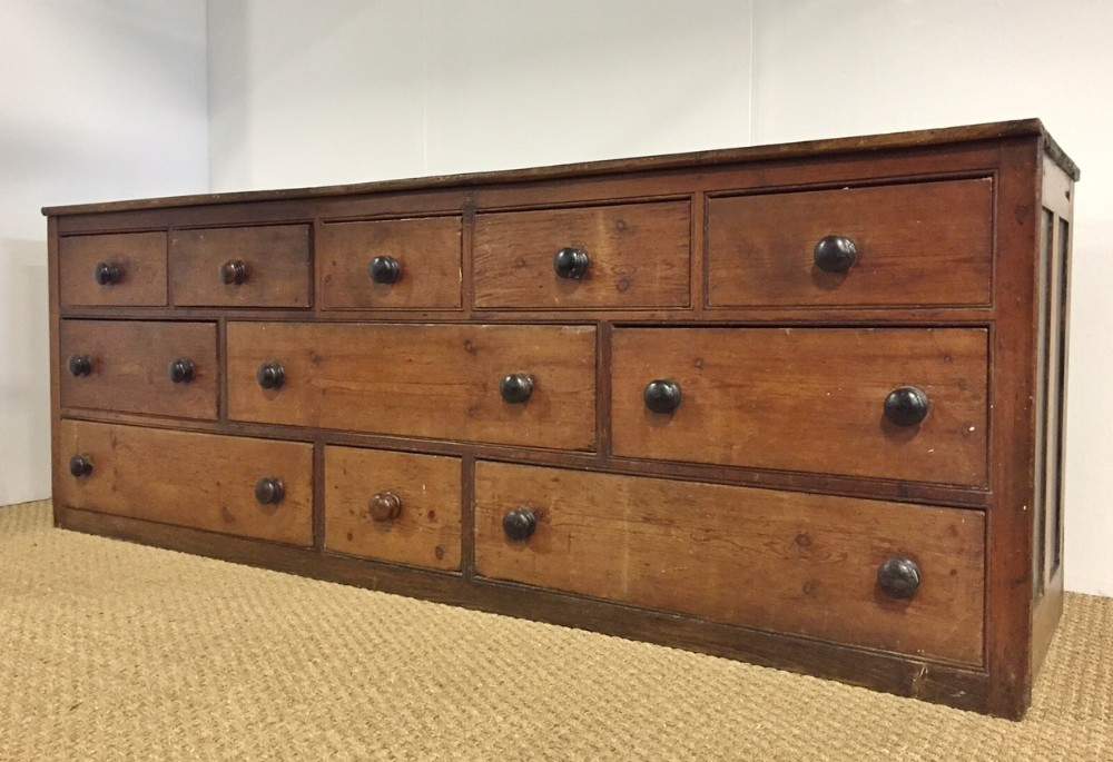 A wonderful late 19th century Somerset elm and pine shop counter c 1880