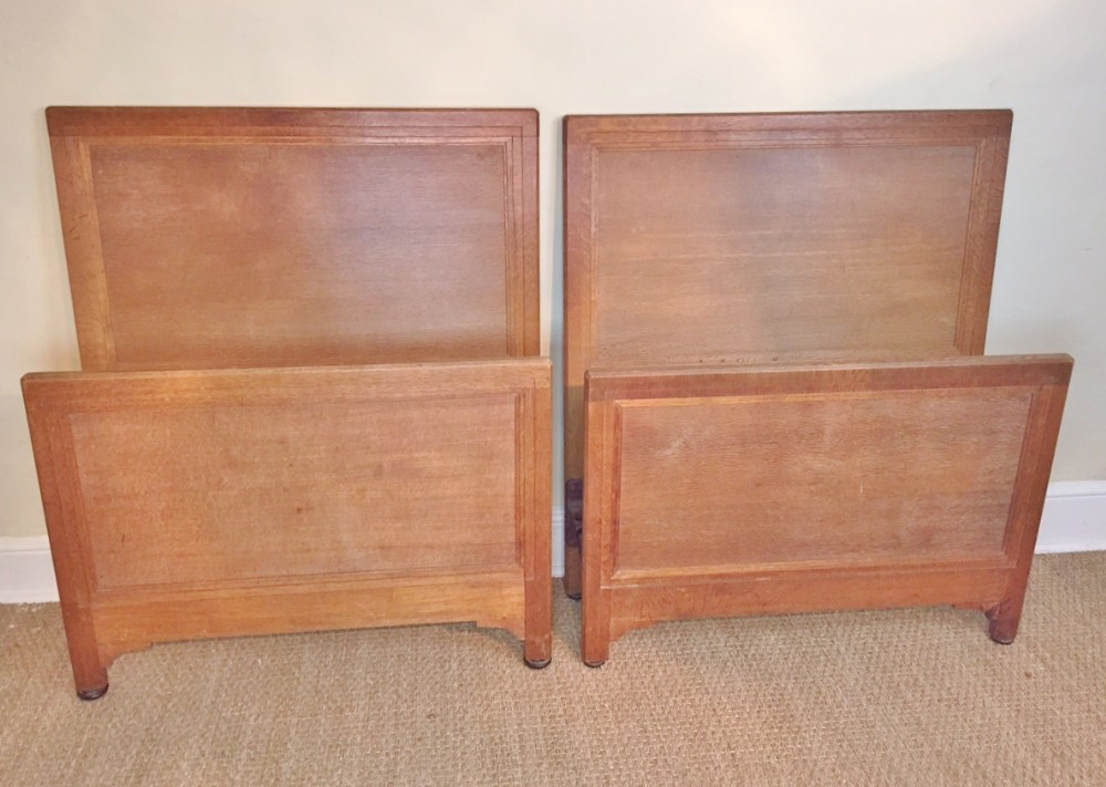 A pair of Heals oak 3ft beds retailed by Harrods of London c 1930