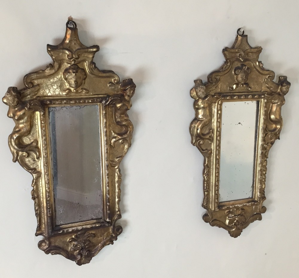 A pair of 18th c Italian gilt girandole mirrors 
