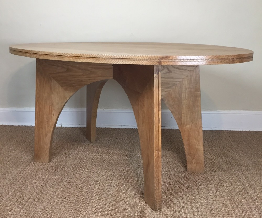 A stylish Arts and Crafts English ash oval breakfast table