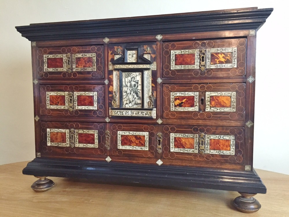 An early 17th century Flemish tortoiseshell Ebony and bone inlaid table cabinet Antwerp c 1625