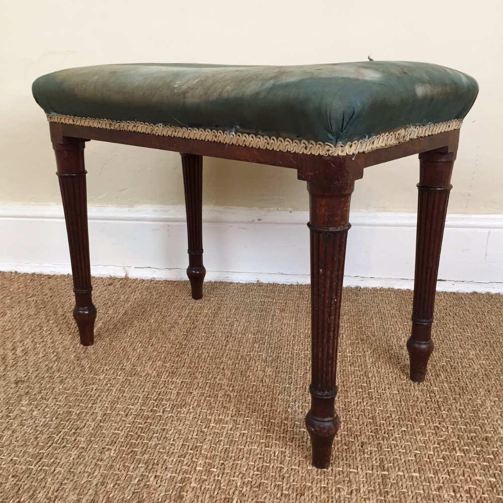 A Regency mahogany fluted leg rectangular stool attributed to Gillows of Lancaster circa 1810