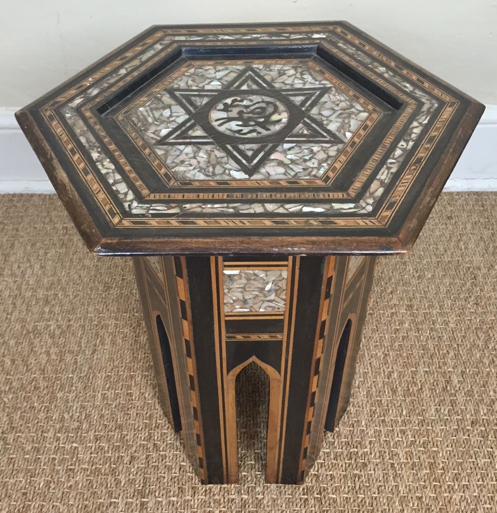 A small Syrian mother of pearl and ebony inlaid hexagonal table Damascus circa 1900