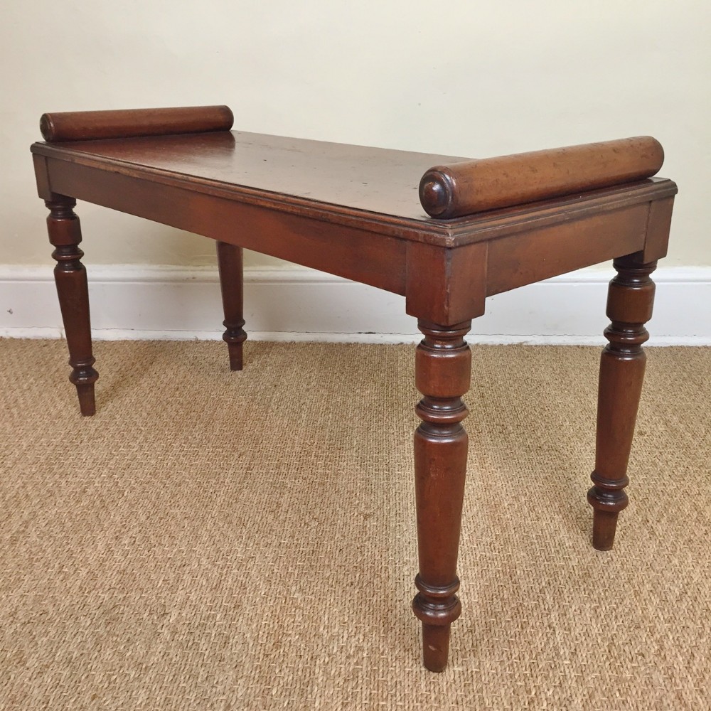 An early Victorian mahogany window seat circa 1850