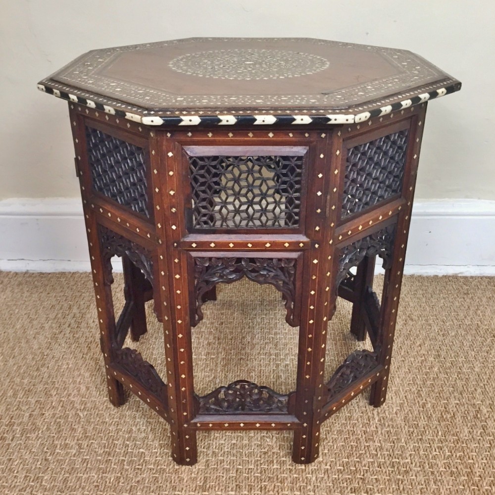 A Hoshiapur bone inlaid and ebony strung octagonal table c 1890.
