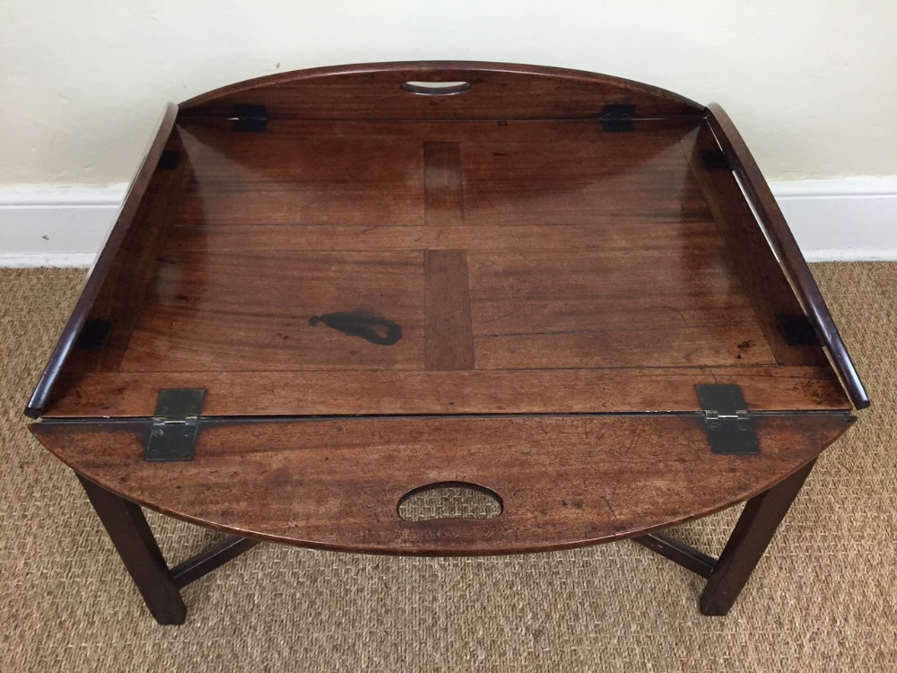 A Regency mahogany butlers tray c 1820 on later stand.