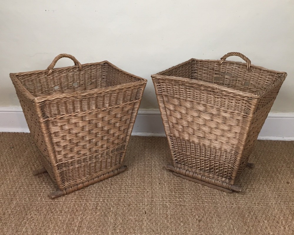 A pair of Edwardian country house wicker laundry or log baskets circa 1910