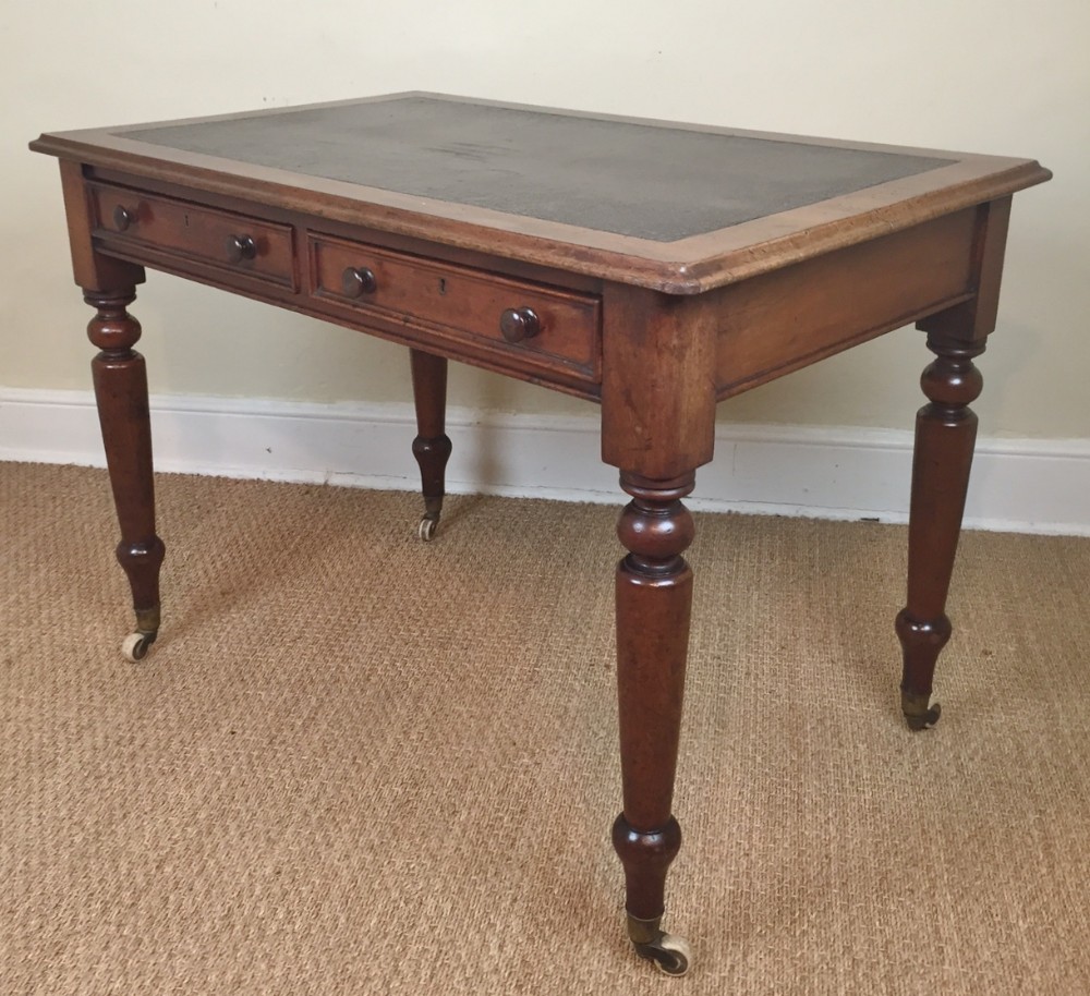 A mid 19th century mahogany writing table circa 1870