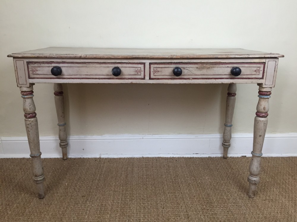 A mid 19th c west country painted 2 drawer side table c 1860