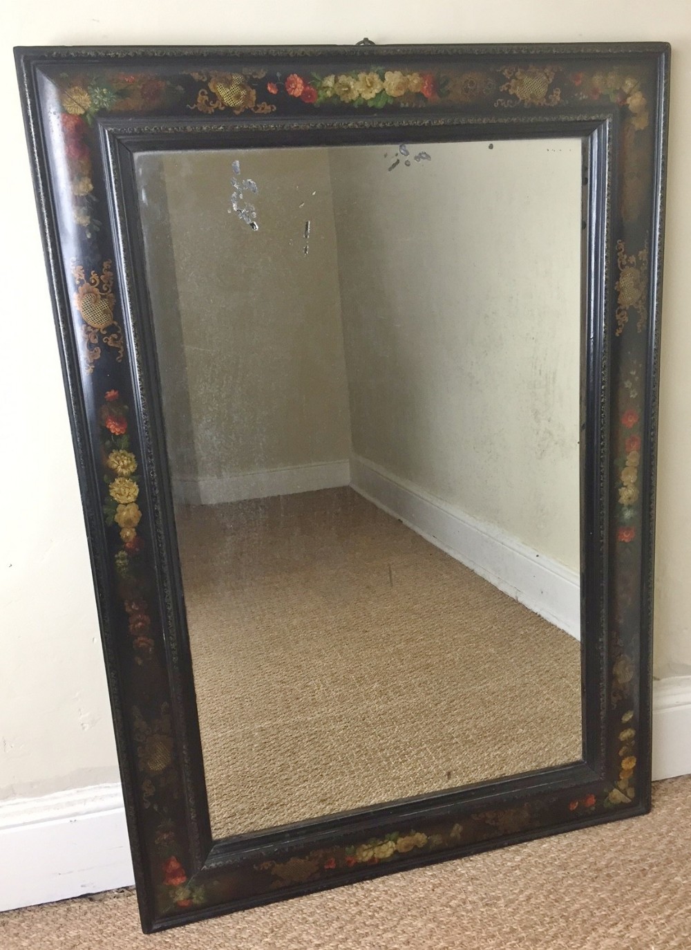 A mid 19th century painted wall mirror of good size c 1850 beautifully decorated in the style of Jennings and Betteridge
