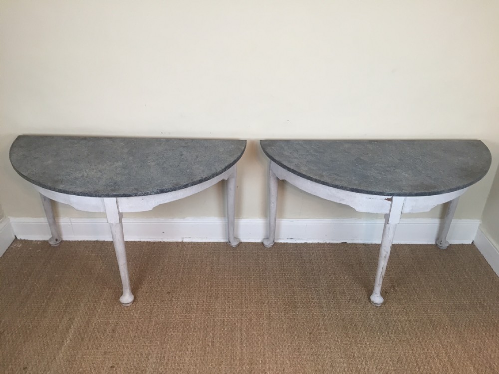 A pair of late George 11 D shaped side tables circa 1760 late painted.