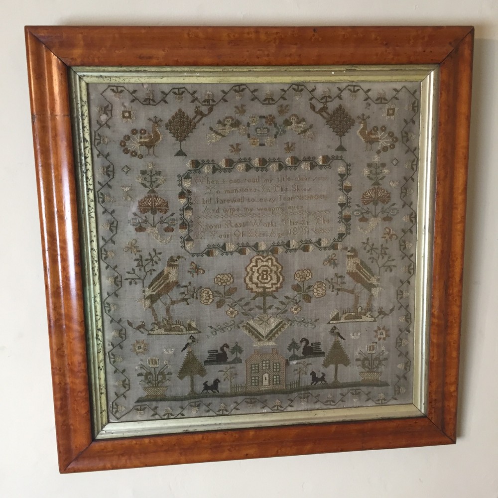 A George IV sampler by Naomi Rust dated 1829