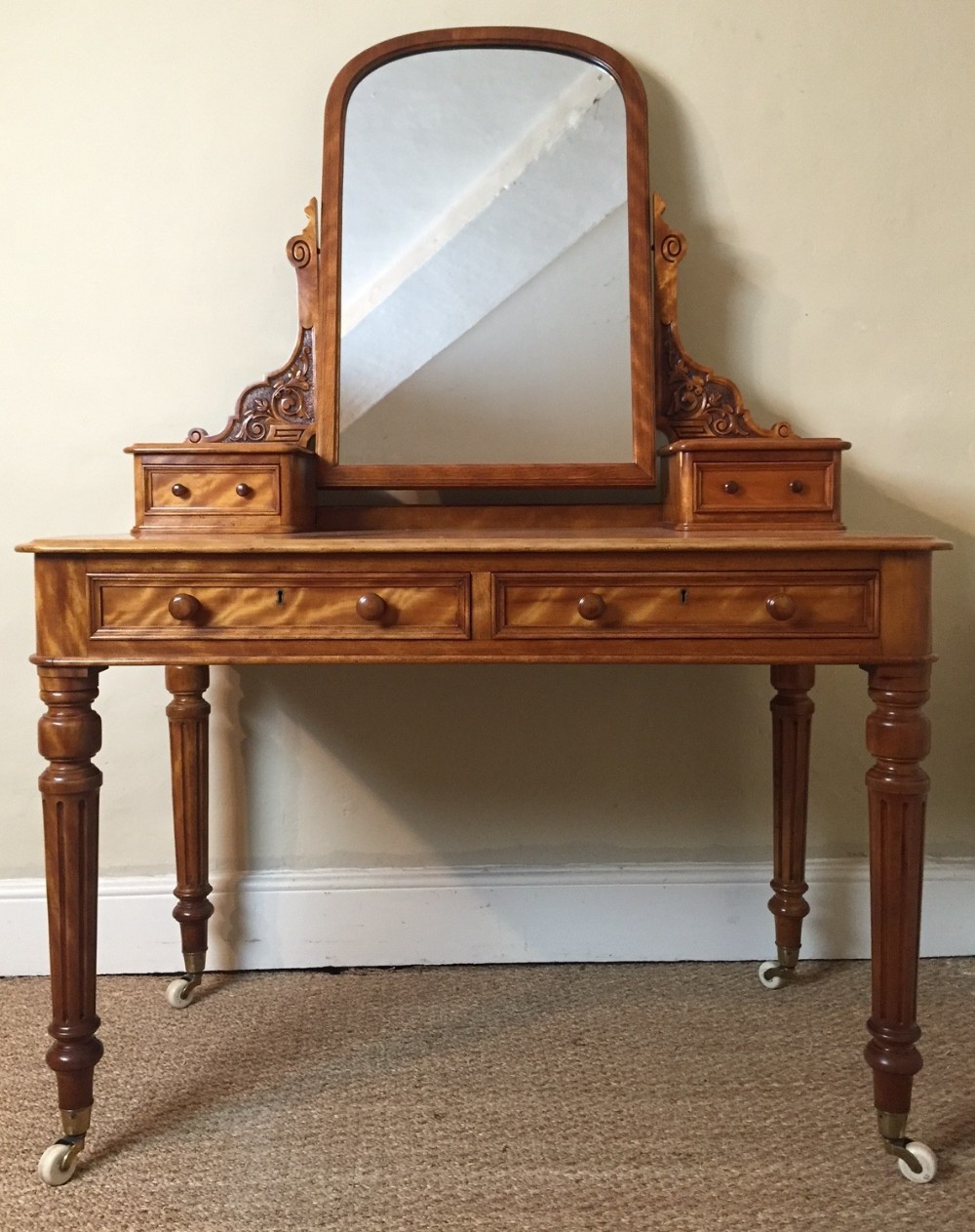 A Victorian satin birch dressing table circa 1870 in the manner of Holland and Sons 