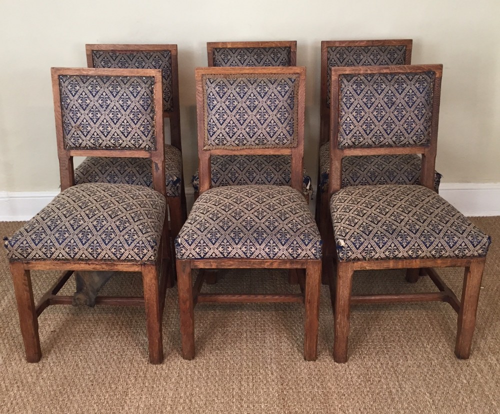  A set of six Heals oak dining chairs c 1910
