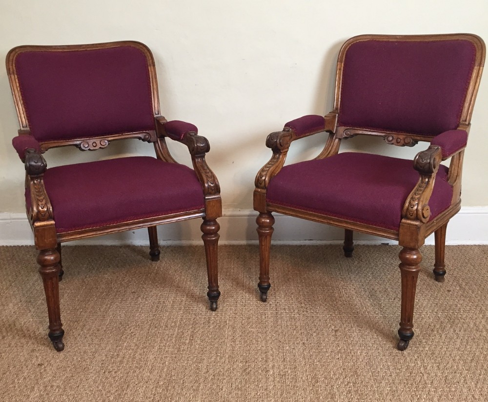 A pair of reformed Gothic Oak library Chairs circa 1880