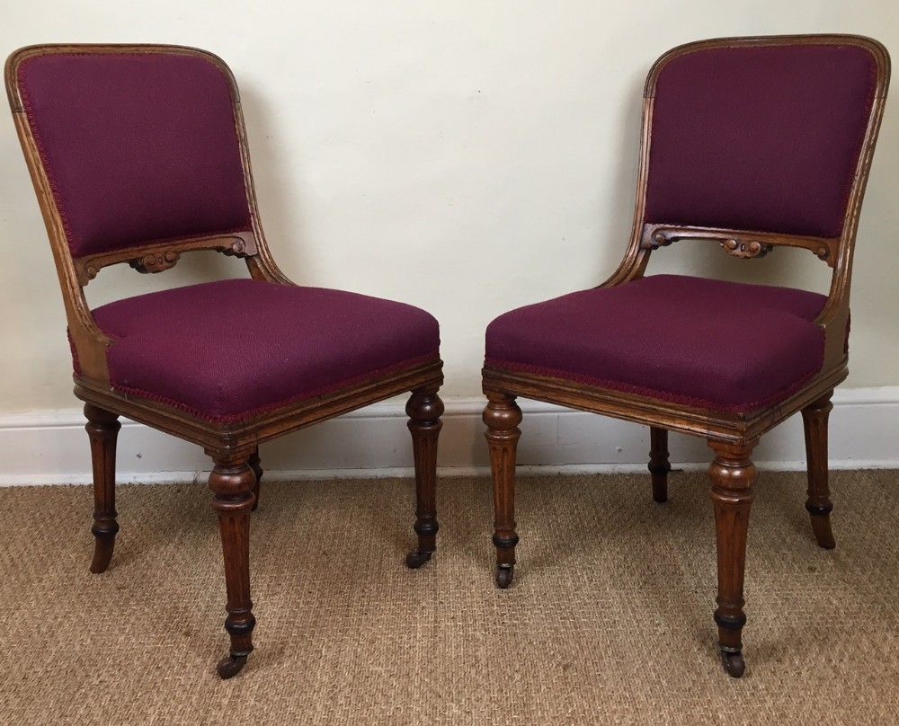A pair of reformed Gothic oak side chairs c 1880 