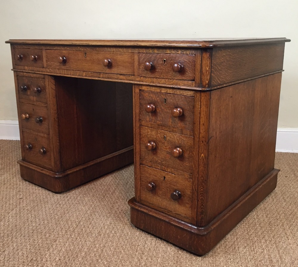 A Victorian oak pedestal desk circa 1880