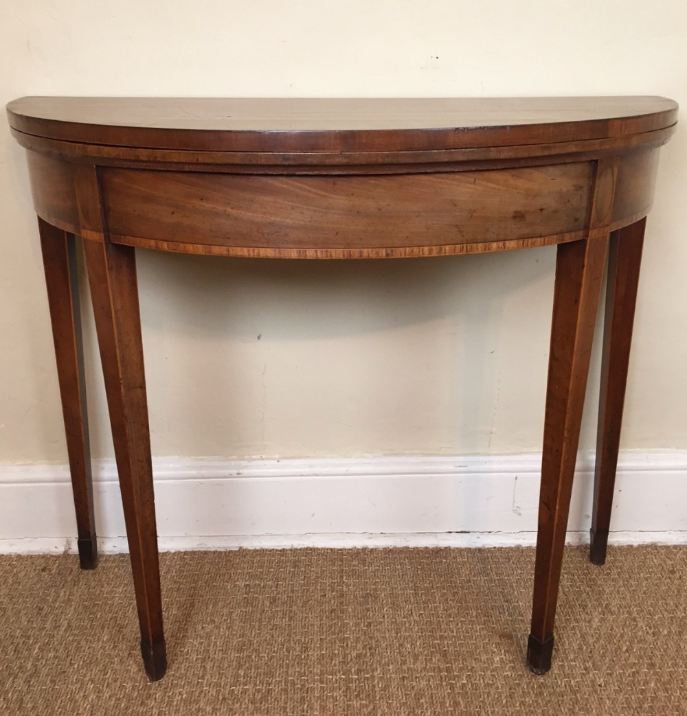 A George III mahogany card table c 1790