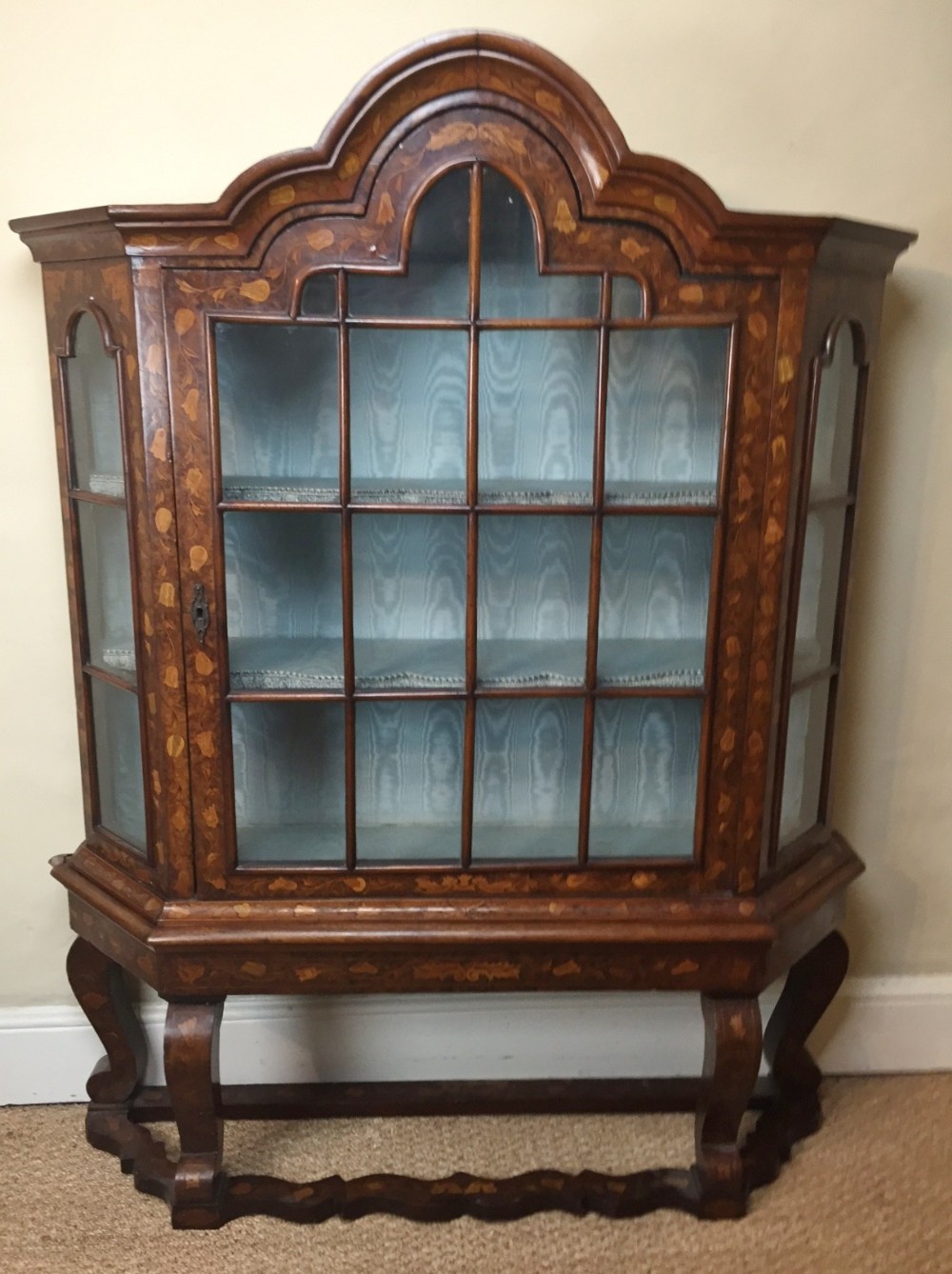 A late 18th c Dutch walnut and marquetry china cabinet c 1780