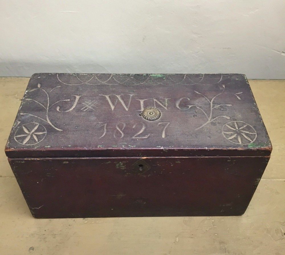 A George IV pine Folk Art pine box inscribed and dated J Wing 1827