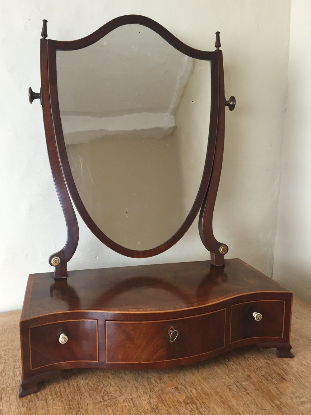 A George 111 mahogany swing frame dressing mirror c 1790
