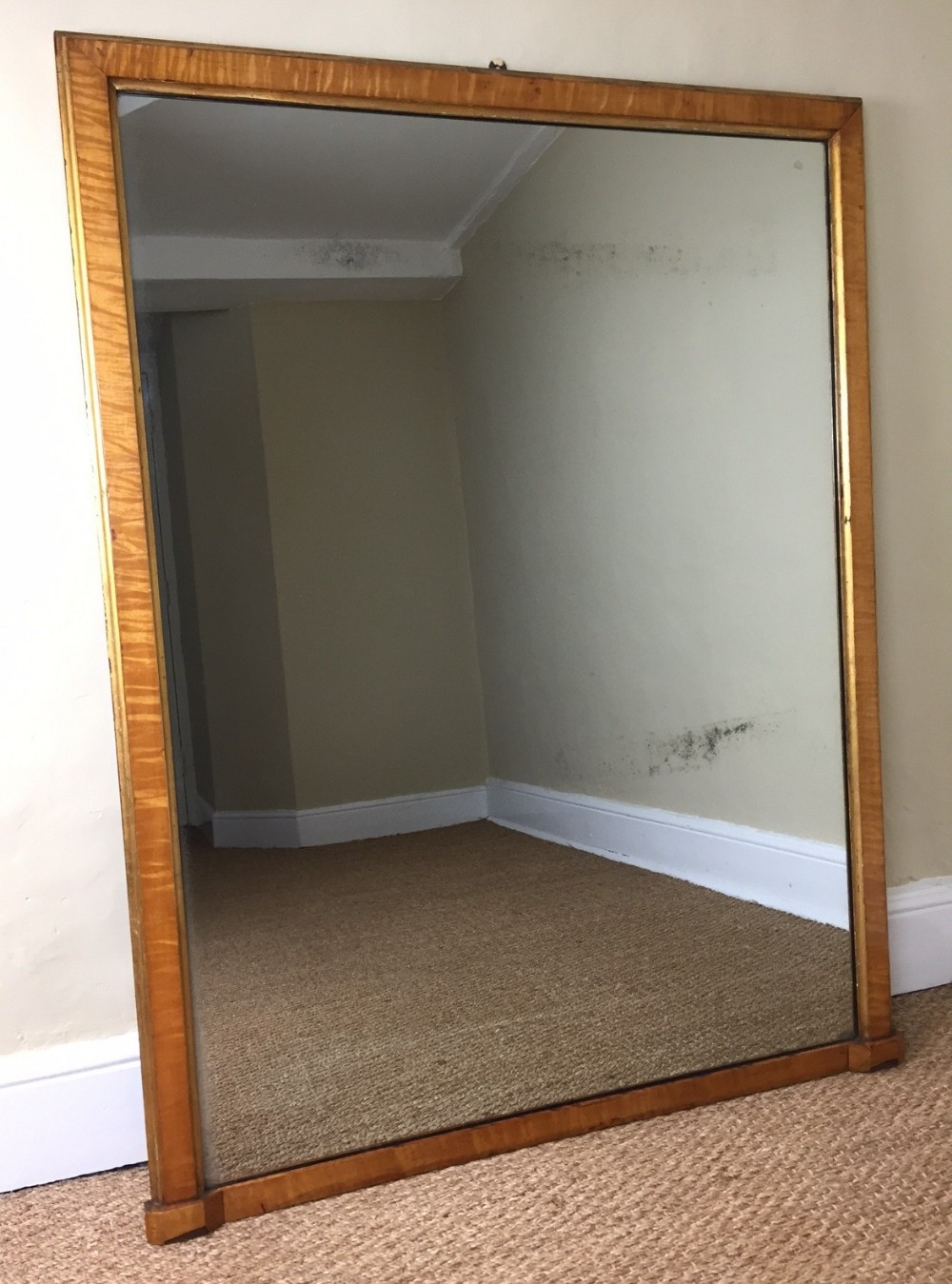 A good sized William IV birds eye maple and parcel gilt overmantel mirror circa 1835