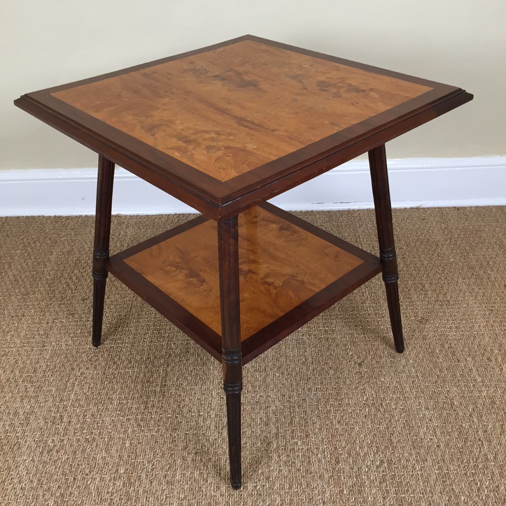 An Aesthetic movement satinwood and mahogany 2 tier table c 1880